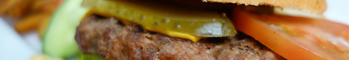 Eating Burger at Tailgaters Burger Co restaurant in Hope, AR.